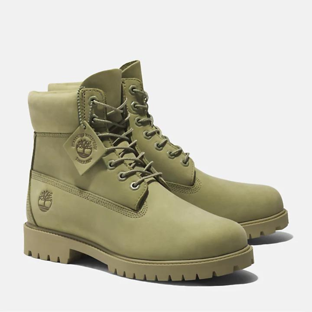 Light green Timberland® Heritage 6-Inch Boot for Men. Unique light green leather boot featuring a classic 6-inch silhouette. Waterproof construction keeps feet dry. Padded collar for comfort, lace-up closure for secure fit. Durable outsole delivers traction