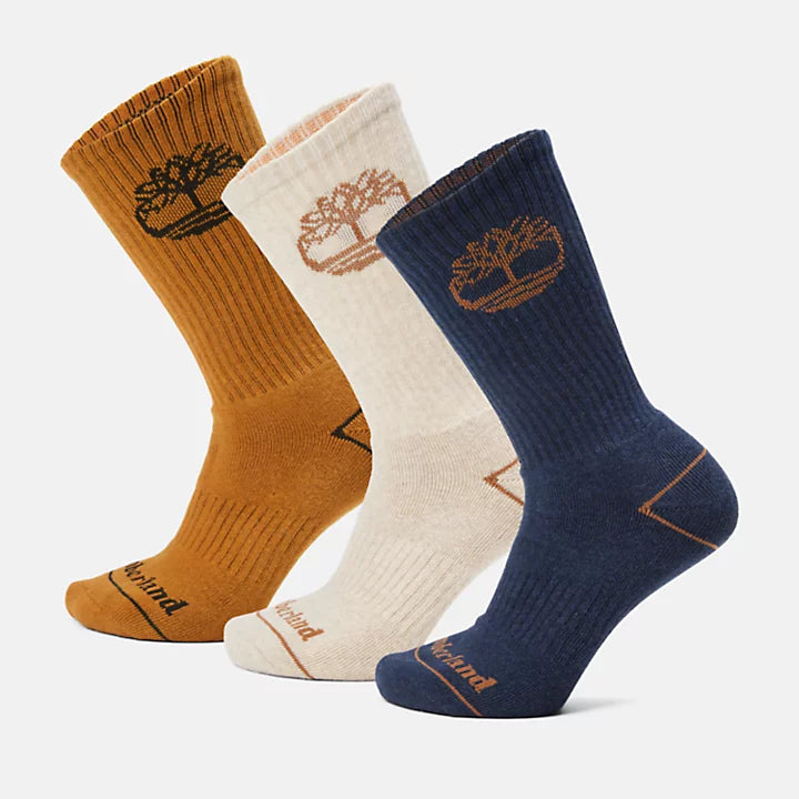 Timberland® 3 Pack Bowden Crew Socks (Multicoloured) for All Genders. Assorted pack of crew socks in various colours and patterns. Cotton blend for comfort and breathability. Full cushion construction for shock absorption. Ribbed arch support for snug fit. Crew length for coverage and warmth. Fun and functional for everyday wear.