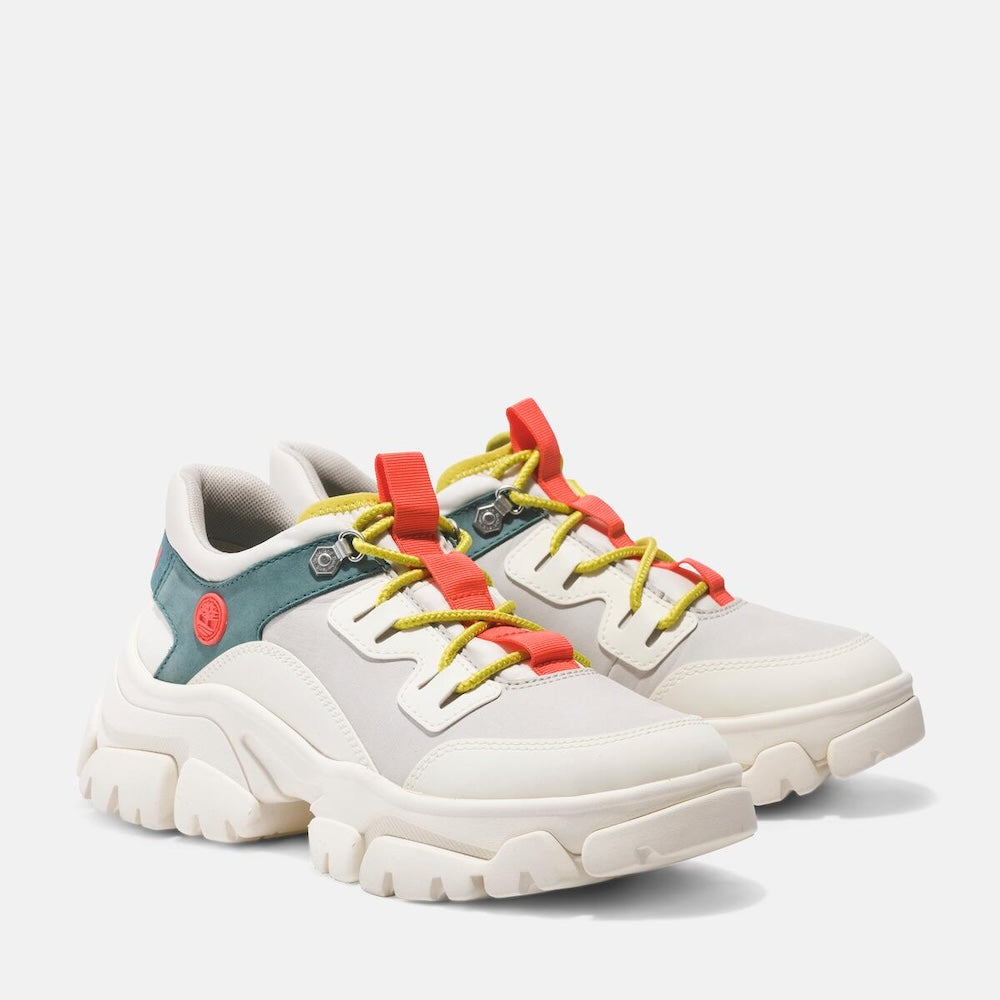 White Timberland® Adley Low Lace-Up Sneaker for Women. Canvas upper for breathability. White base with bright multi-color features. Lace-up closure for secure fit. Comfortable footbed for support and cushioning. Durable rubber outsole for traction.