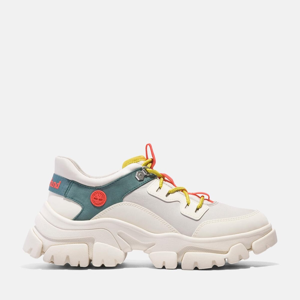 White Timberland® Adley Low Lace-Up Sneaker for Women. Canvas upper for breathability. White base with bright multi-color features. Lace-up closure for secure fit. Comfortable footbed for support and cushioning. Durable rubber outsole for traction.