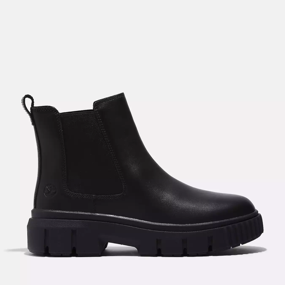 Black Timberland® Greyfield Mid Chelsea Boot for Women. Premium full-grain leather upper for luxury and durability. Chelsea boot silhouette for a sleek, modern look. Double stretch gore panels for comfortable fit and easy on-and-off wear.