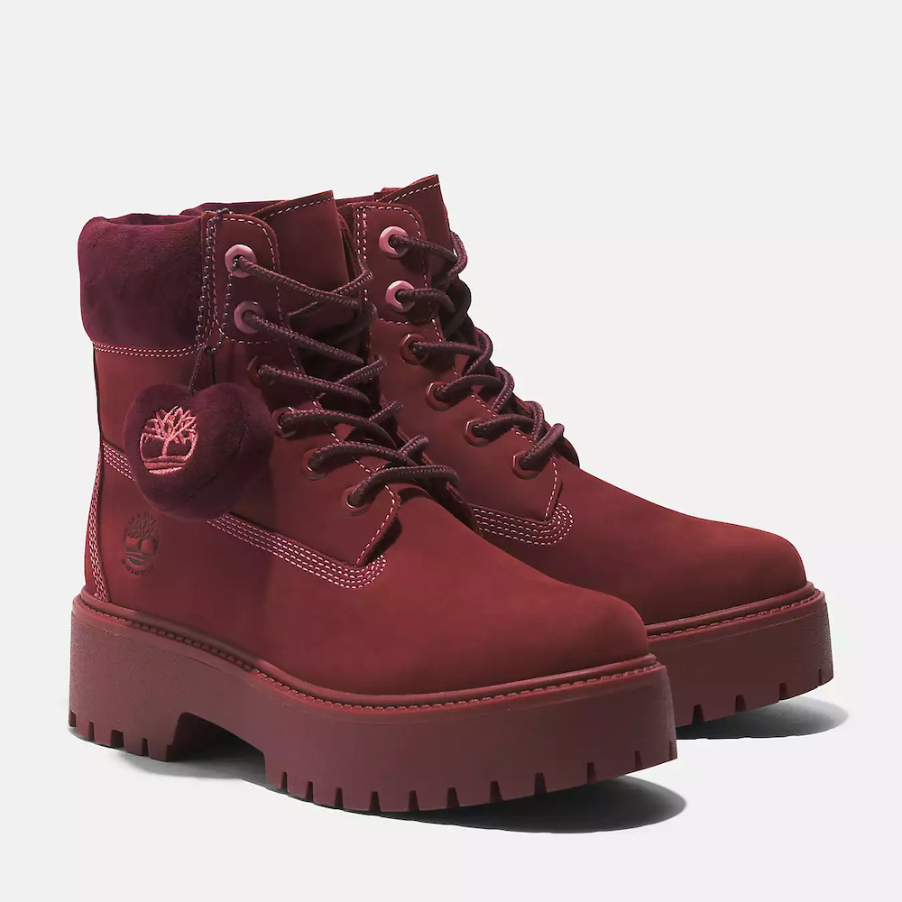 Timberland® Stone Street Platform 6-Inch Lace Up Waterproof Boot for Women. Deep red leather platform boot featuring waterproof construction to keep feet dry, padded collar for comfort, signature lug sole with added height for a stylish look, and lace-up closure for a secure fit. Perfect for wet weather and adding a touch of edge to your outfit.