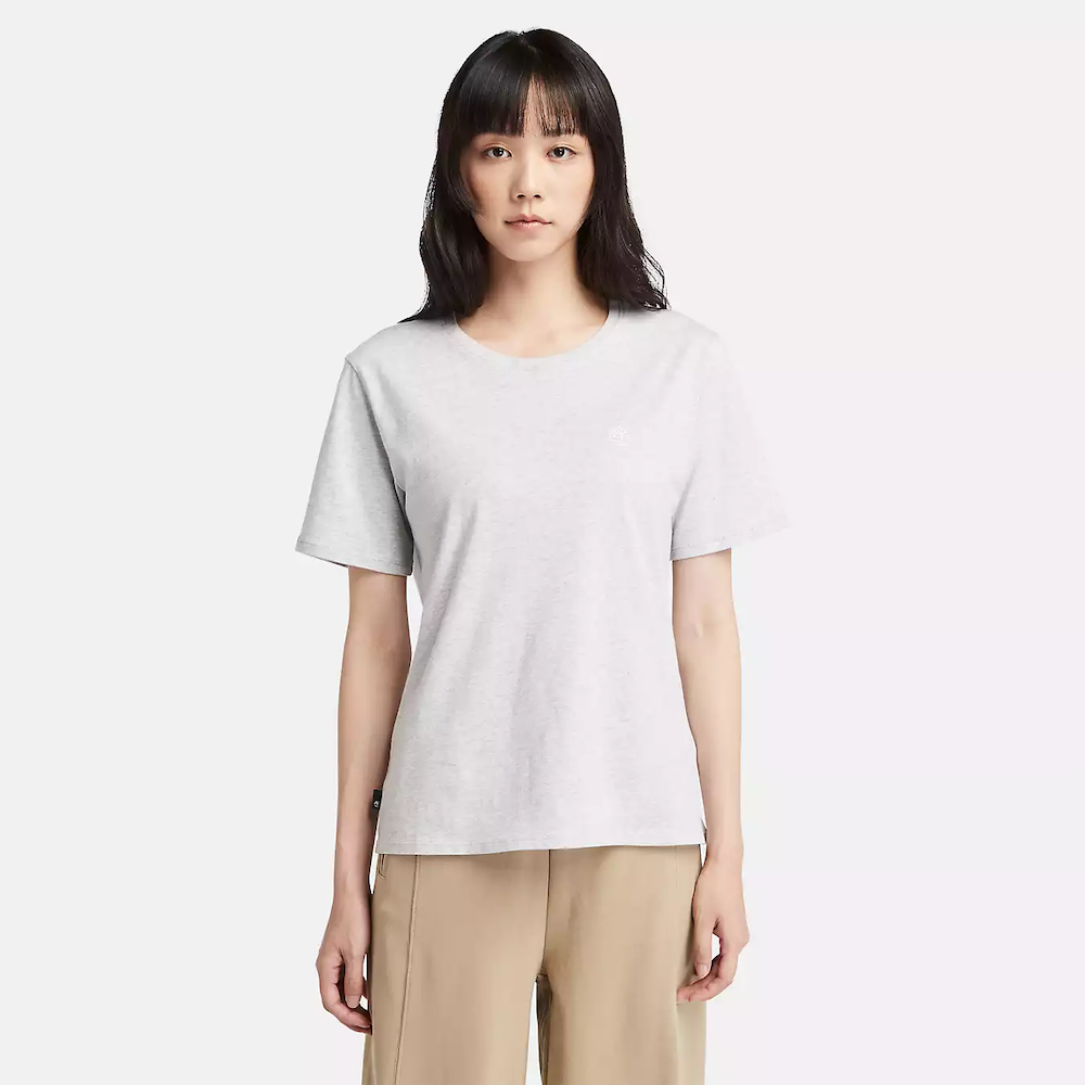 Light grey Timberland® Dunstan Short Sleeve Tee for Women. Crewneck t-shirt made from 100% cotton featuring a relaxed, regular fit for comfortable wear.  A ribbed collar adds structure, while a small embroidered Timberland® tree logo sits on the chest