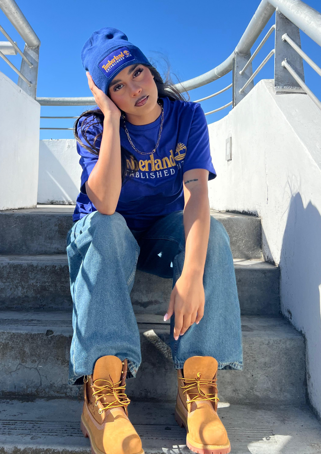 Girls shop wearing timbs