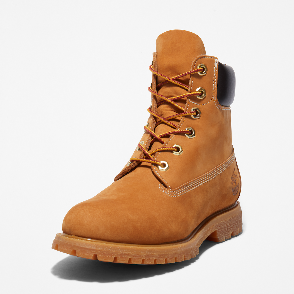 Wheat TimberlandÂ® 6-Inch Boot for Women. Waterproof leather, padded collar, lace-up closure. Durable outsole for all terrains. Classic style for everyday adventures.