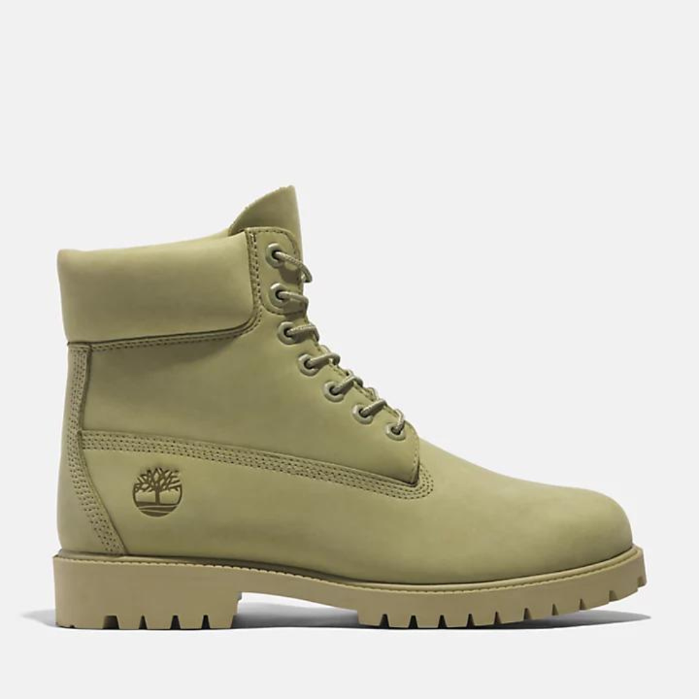 Light green Timberland® Heritage 6-Inch Boot for Men. Unique light green leather boot featuring a classic 6-inch silhouette. Waterproof construction keeps feet dry. Padded collar for comfort, lace-up closure for secure fit. Durable outsole delivers traction