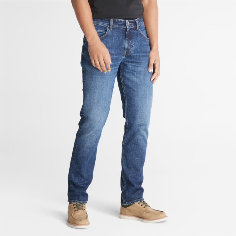 Timberland Indigo Stretch Denim for Men in Indigo. Made with organic cotton for sustainability and comfort. Slim-fit cut for modern style. Classic 5-pocket design for functionality. Indigo wash for timeless look.