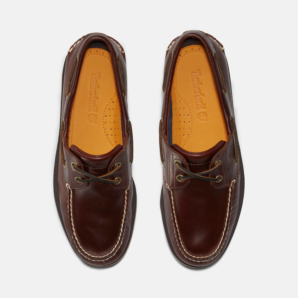 TimberlandÃ‚Â® Classic 2-Eye Boat Shoe for Men. Dark brown leather boat shoe featuring a hand-sewn construction for durability, 360Ã‚Â° lacing system for a secure fit, leather-lined footbed for comfort, and non-marking outsole for traction. Perfect for casual wear or boat days.