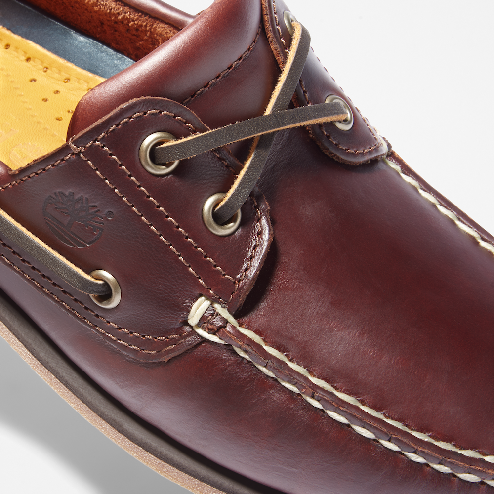 TimberlandÃ‚Â® Classic 2-Eye Boat Shoe for Men. Dark brown leather boat shoe featuring a hand-sewn construction for durability, 360Ã‚Â° lacing system for a secure fit, leather-lined footbed for comfort, and non-marking outsole for traction. Perfect for casual wear or boat days.