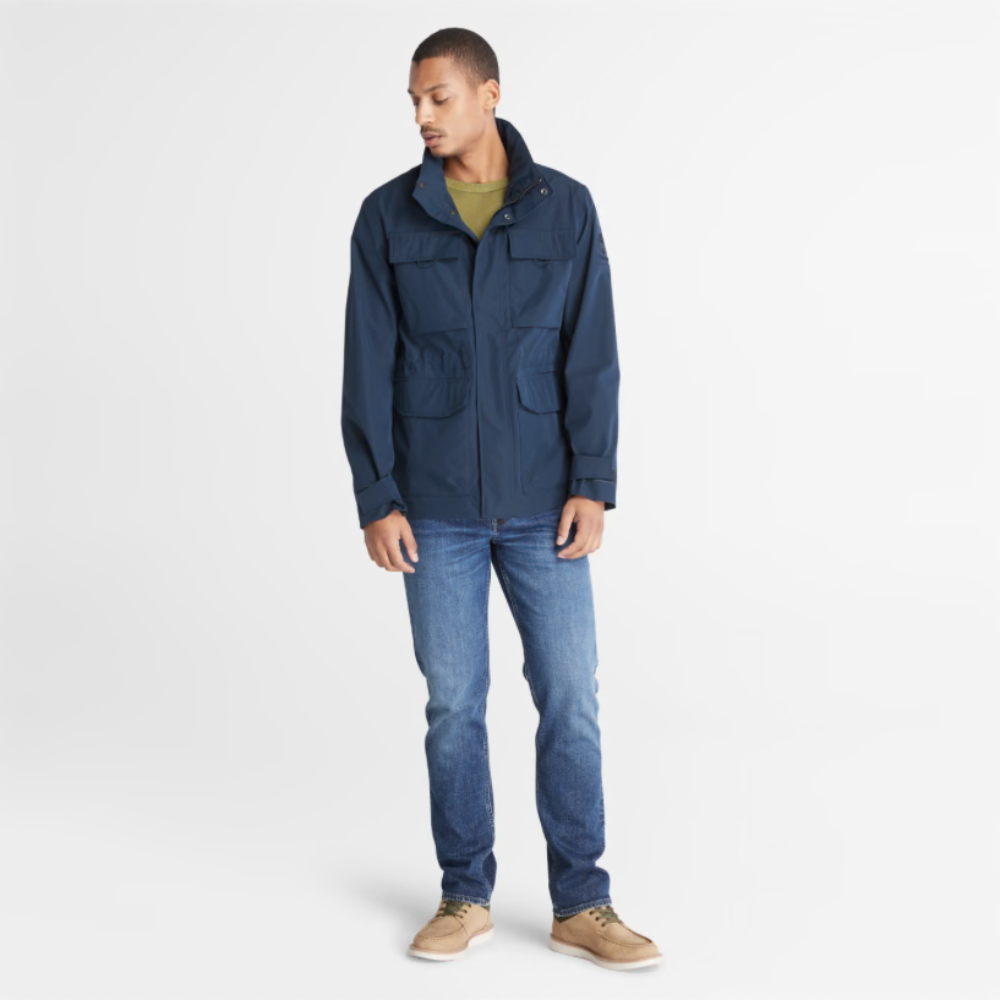 Timberland® Indigo Stretch Denim for Men in Indigo. Made with organic cotton for sustainability and comfort. Slim-fit cut for modern style. Classic 5-pocket design for functionality. Indigo wash for timeless look.