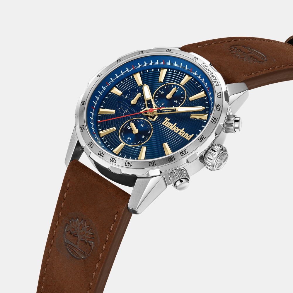 Timberland® Kennebunk Watch for Men. Stainless steel case with a navy blue dial and clear markers. Rich brown leather strap for a timeless and sophisticated look with a touch of nautical flair.