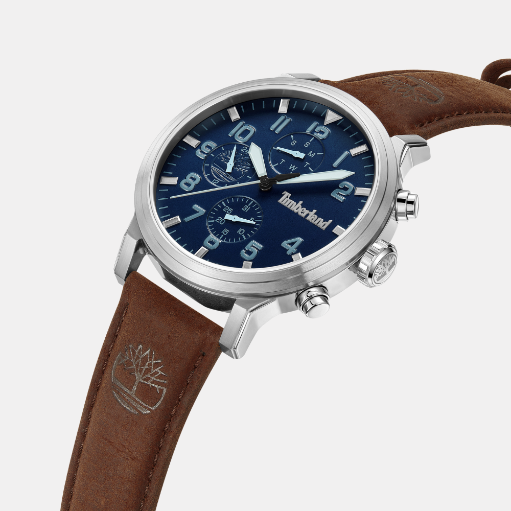 TimberlandÂ® Driscoll Watch for Men. Stainless steel case with dark blue dial and clear markers. Rich brown leather strap for a sophisticated look. 