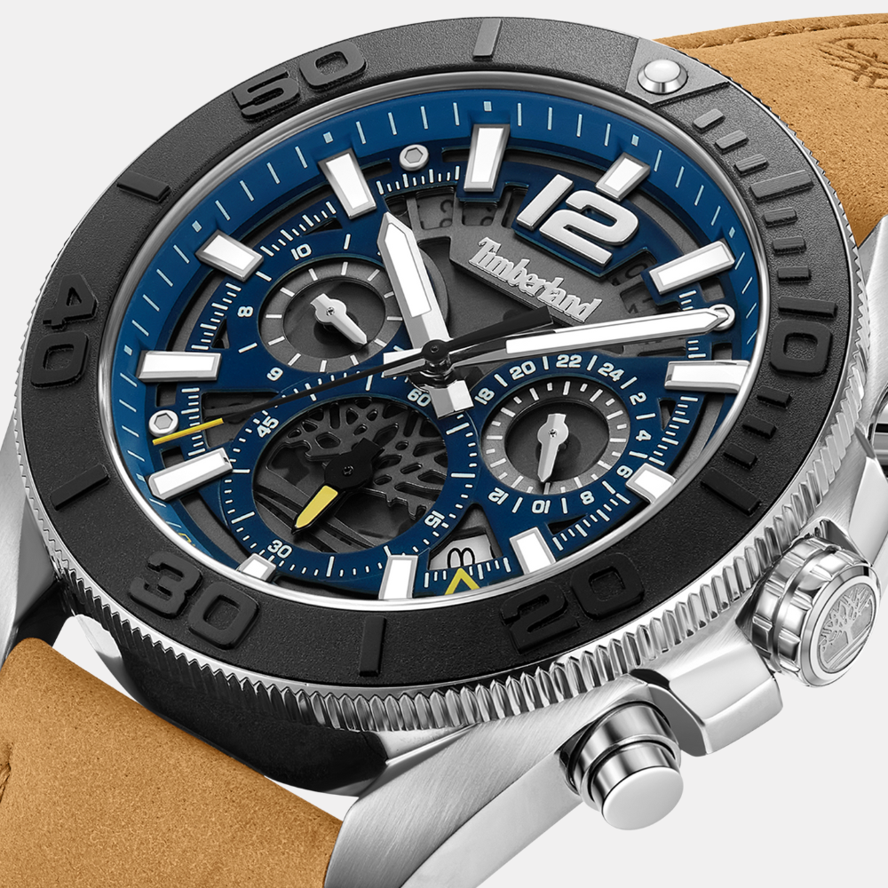 Timberland® Marshfield Watch for Men. Stainless steel case with a navy blue dial and clear markers. Warm wheat leather strap for a classic and timeless look with a touch of nautical flair.