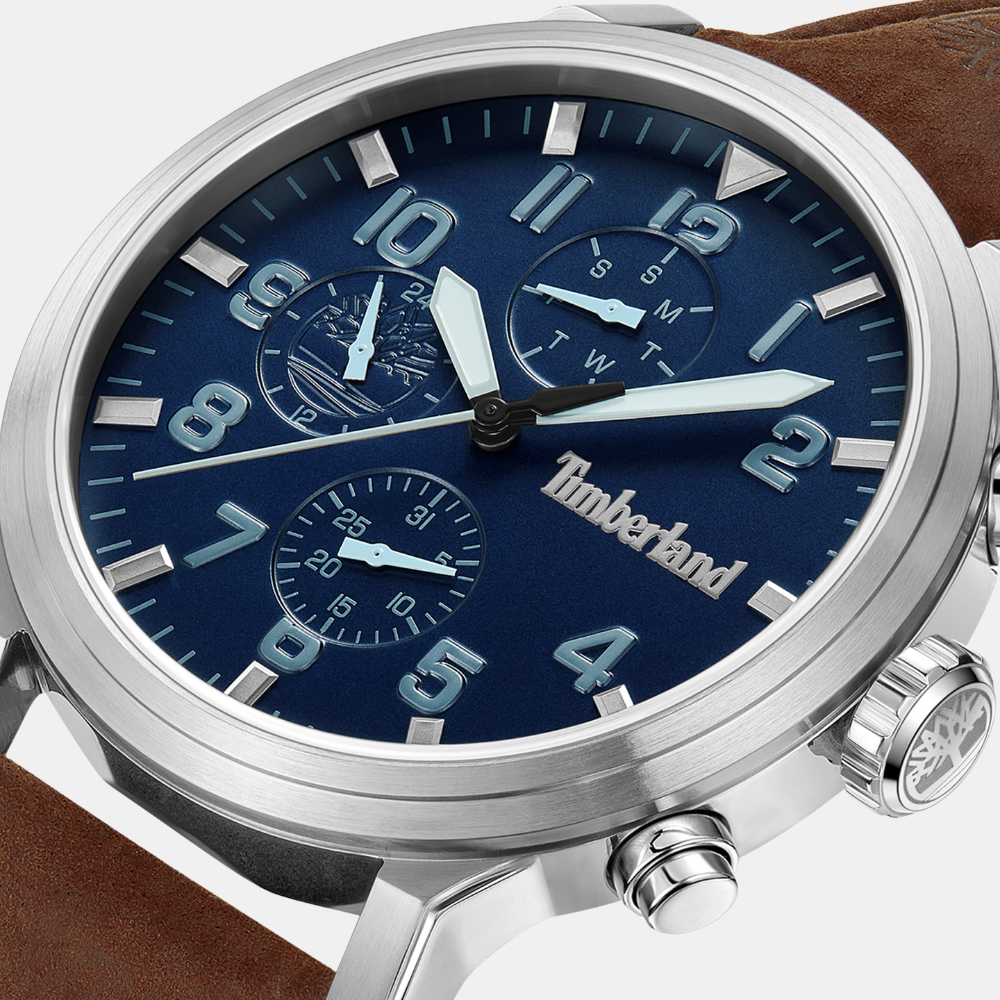 TimberlandÂ® Driscoll Watch for Men. Stainless steel case with dark blue dial and clear markers. Rich brown leather strap for a sophisticated look. 