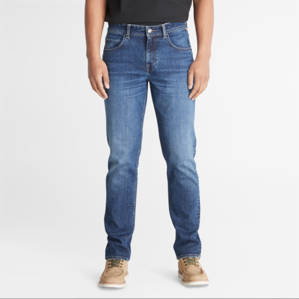 Timberland Indigo Stretch Denim for Men in Indigo. Made with organic cotton for sustainability and comfort. Slim-fit cut for modern style. Classic 5-pocket design for functionality. Indigo wash for timeless look.