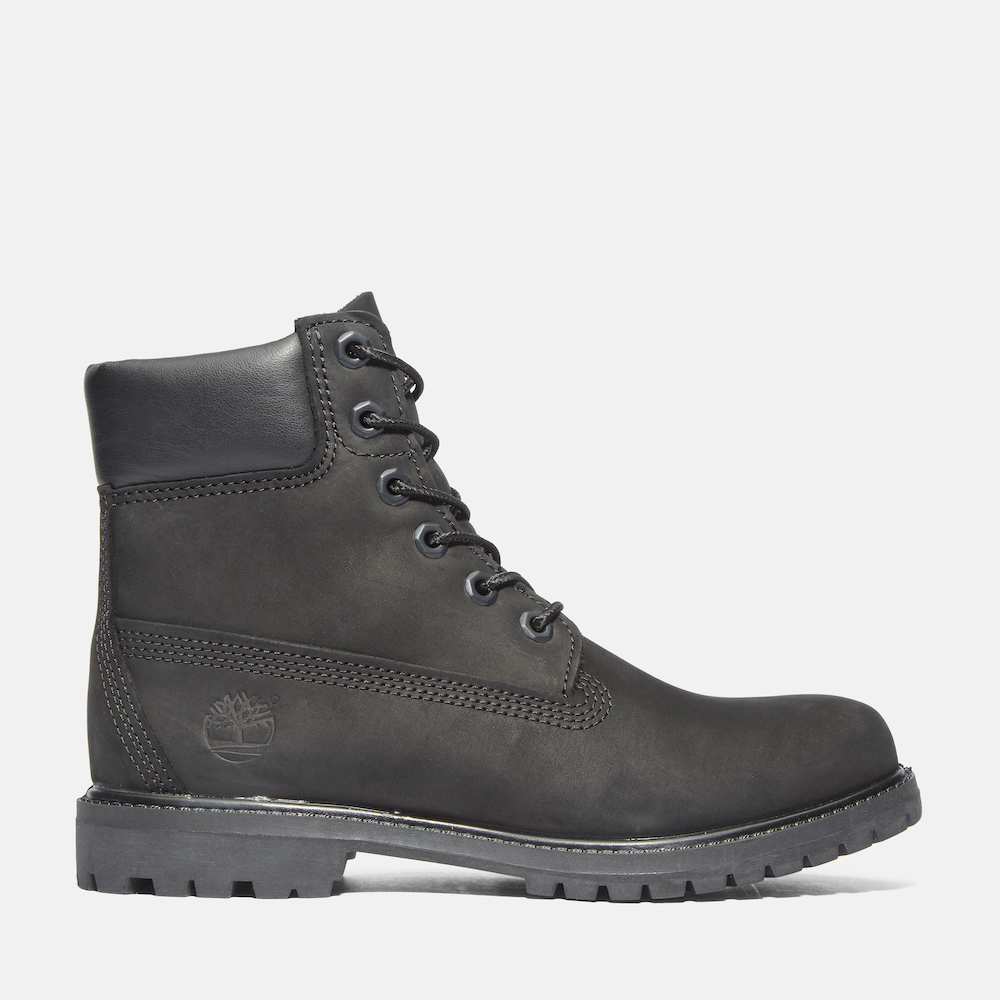 Timberland® Premium 6-Inch Boot for Women in Black. Black nubuck leather boot featuring waterproof construction to keep feet dry, padded collar for comfort, signature lug sole for traction, and lace-up closure for a secure fit. A versatile and empowering choice for everyday wear or outdoor adventures.