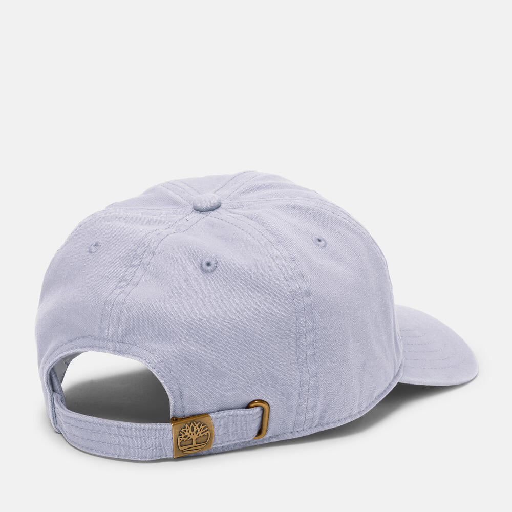  Timberland® Soundview Cotton Canvas Baseball Cap in Lilac. Lilac cotton canvas baseball cap with embroidered eyelets and adjustable strap. Lightweight and comfortable for casual wear or sun protection. Classic design with a unique touch of color.