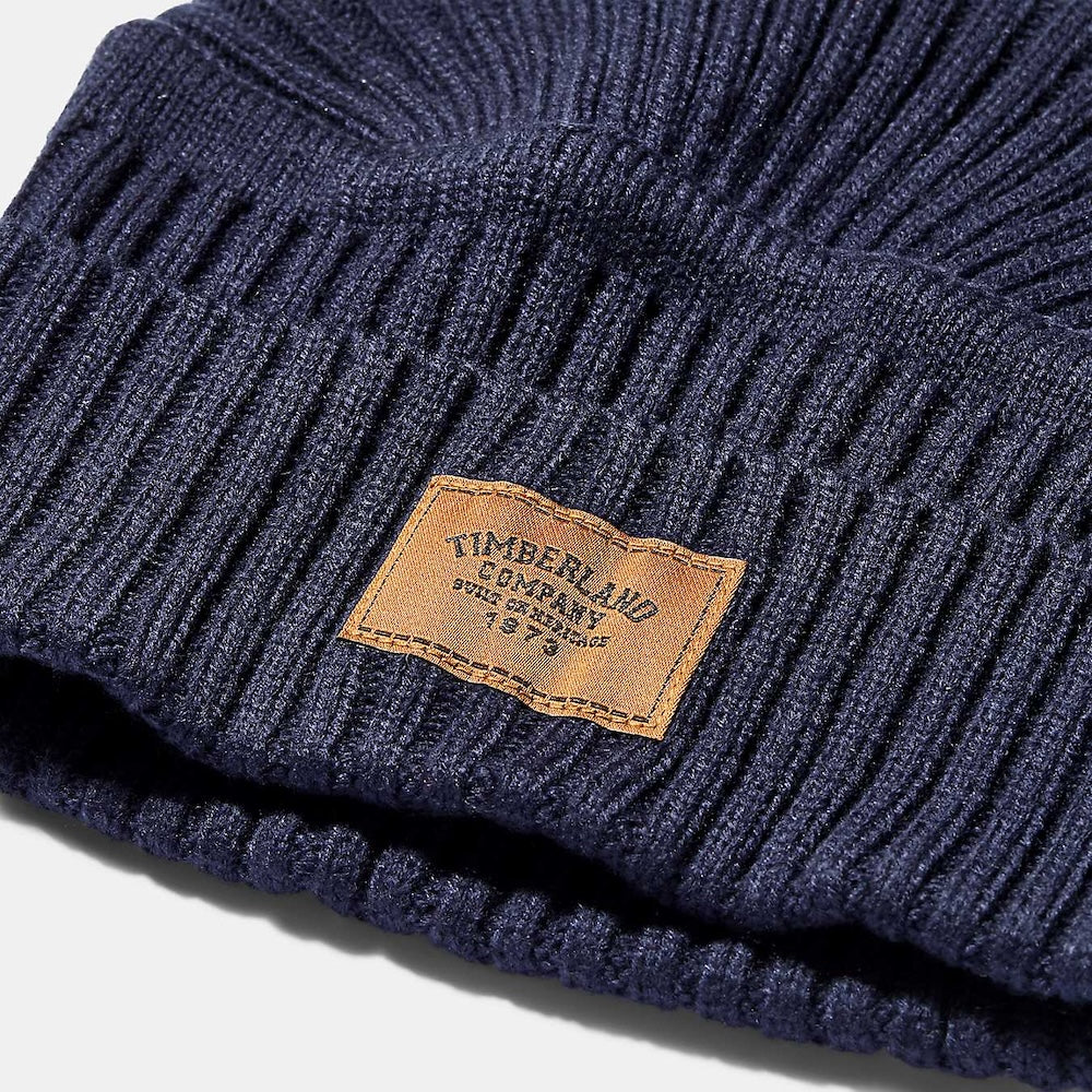 TimberlandÂ® Ribbed Beanie. Soft acrylic for comfort. Ribbed knit pattern for style. Woven TimberlandÂ® logo patch. Fold-up cuff for adjustable fit. Single layer for breathability. One size fits most.