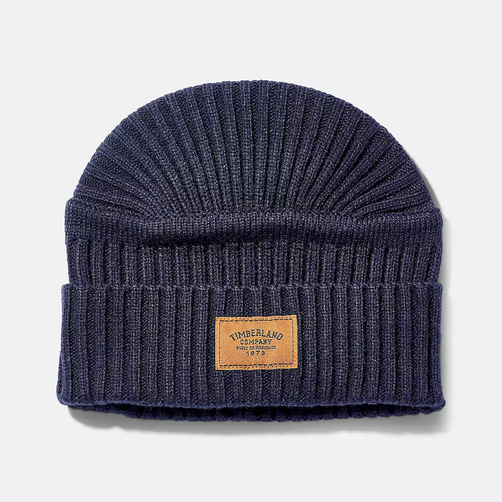 Timberland® Ribbed Beanie. Soft acrylic for comfort. Ribbed knit pattern for style. Woven Timberland® logo patch. Fold-up cuff for adjustable fit. Single layer for breathability. One size fits most