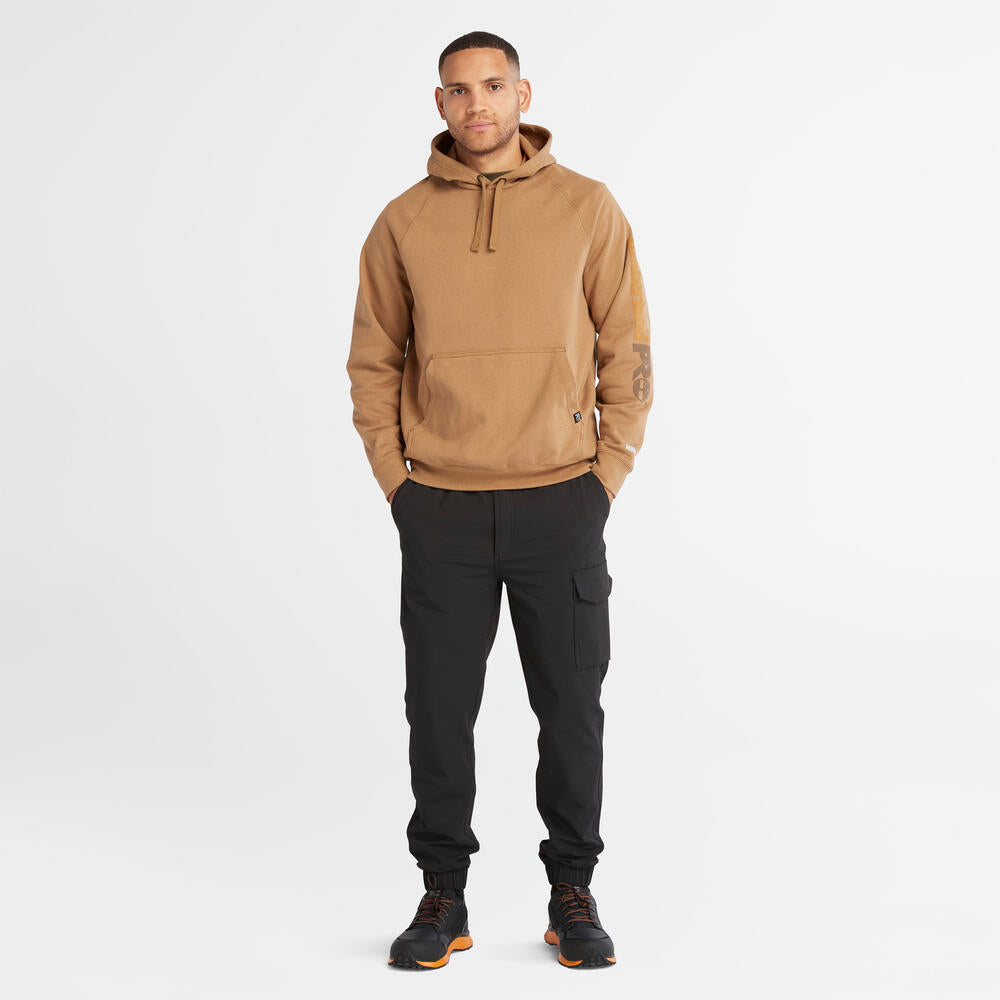 Timberland PRO Hood Honcho Sport Hoodie in Dark Wheat. Durable workwear hoodie with hidden phone pocket. Relaxed fit for comfort. Great for professionals.