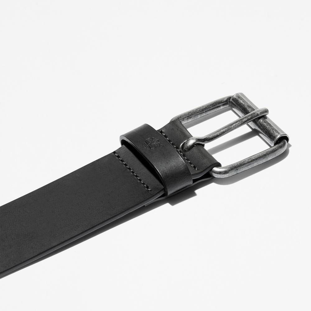 Black Timberland€š® Recycled Leather Belt. Black belt crafted from recycled materials for eco-conscious style. Antique-finish buckle for a vintage touch. Classic design pairs with jeans, chinos, or dress pants.