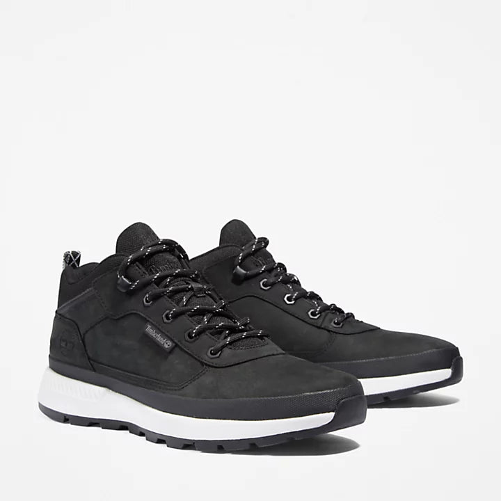 Black Timberland¡ Field Trekker Low Hiker for Men. Black leather hiking shoe with water-resistant protection for light rain. Breathable mesh lining for comfort. OrthoLite¡ footbed for cushioning, EVA midsole for support. Durable outsole delivers traction on trails or streets. Versatile for both city and outdoor adventures.