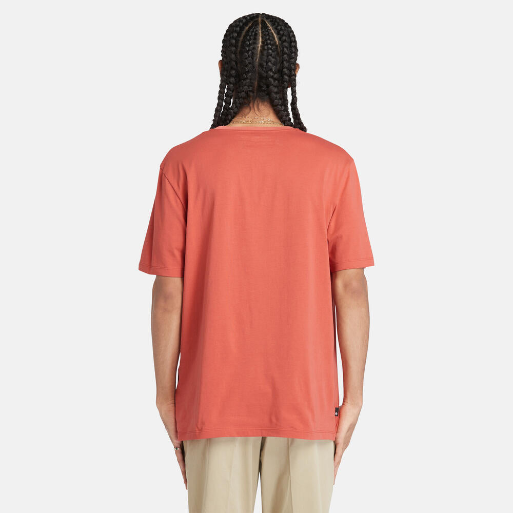 Timberland‚¡® Kennebec River Linear T-Shirt for Men in Coral. Coral t-shirt for men with a bold linear Timberland‚¡® logo. Made from eco-conscious cotton for a sustainable choice. Relaxed fit for comfort. Versatile for casual wear or layering.