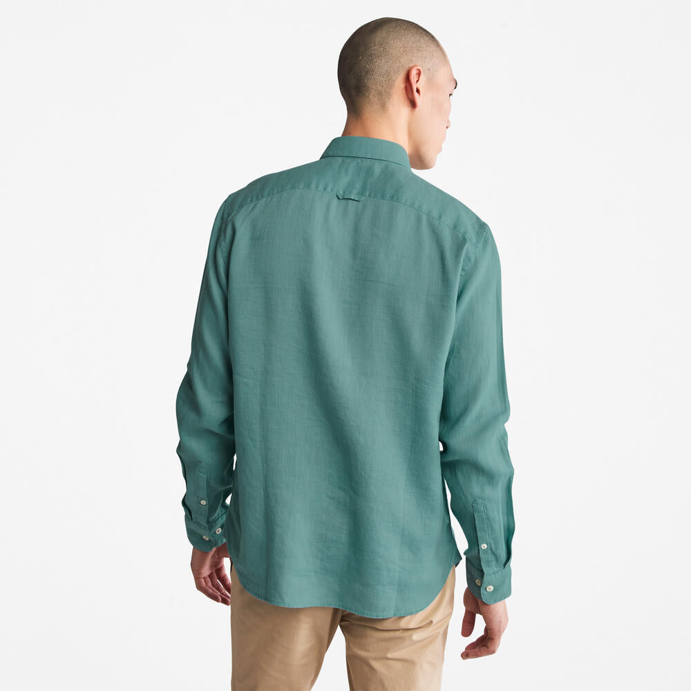 Timberland Mill Brook Linen Shirt for Men in Teal. Teal linen shirt for men with a button-down collar and relaxed fit. Perfect for warm weather and casual occasions.