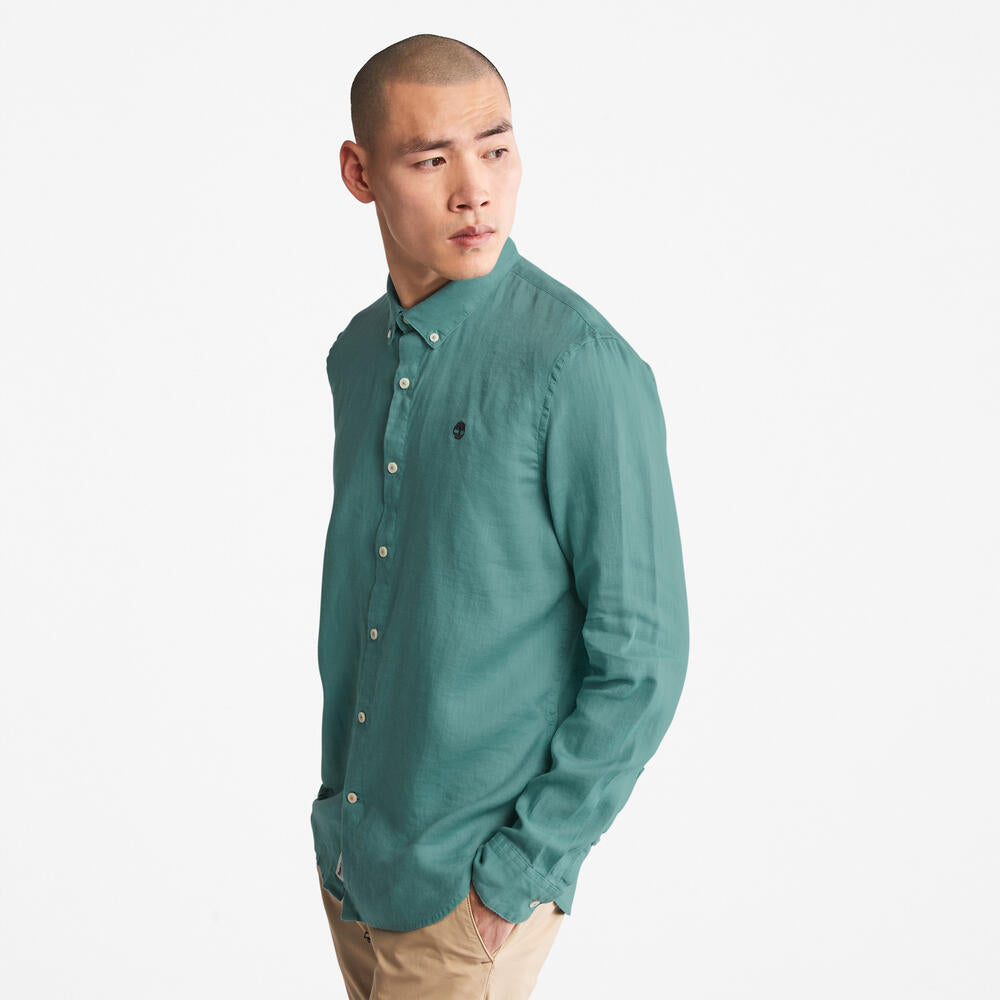 Timberland Mill Brook Linen Shirt for Men in Teal. Teal linen shirt for men with a button-down collar and relaxed fit. Perfect for warm weather and casual occasions.
