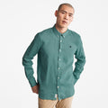 Timberland Mill Brook Linen Shirt for Men in Teal. Teal linen shirt for men with a button-down collar and relaxed fit. Perfect for warm weather and casual occasions.