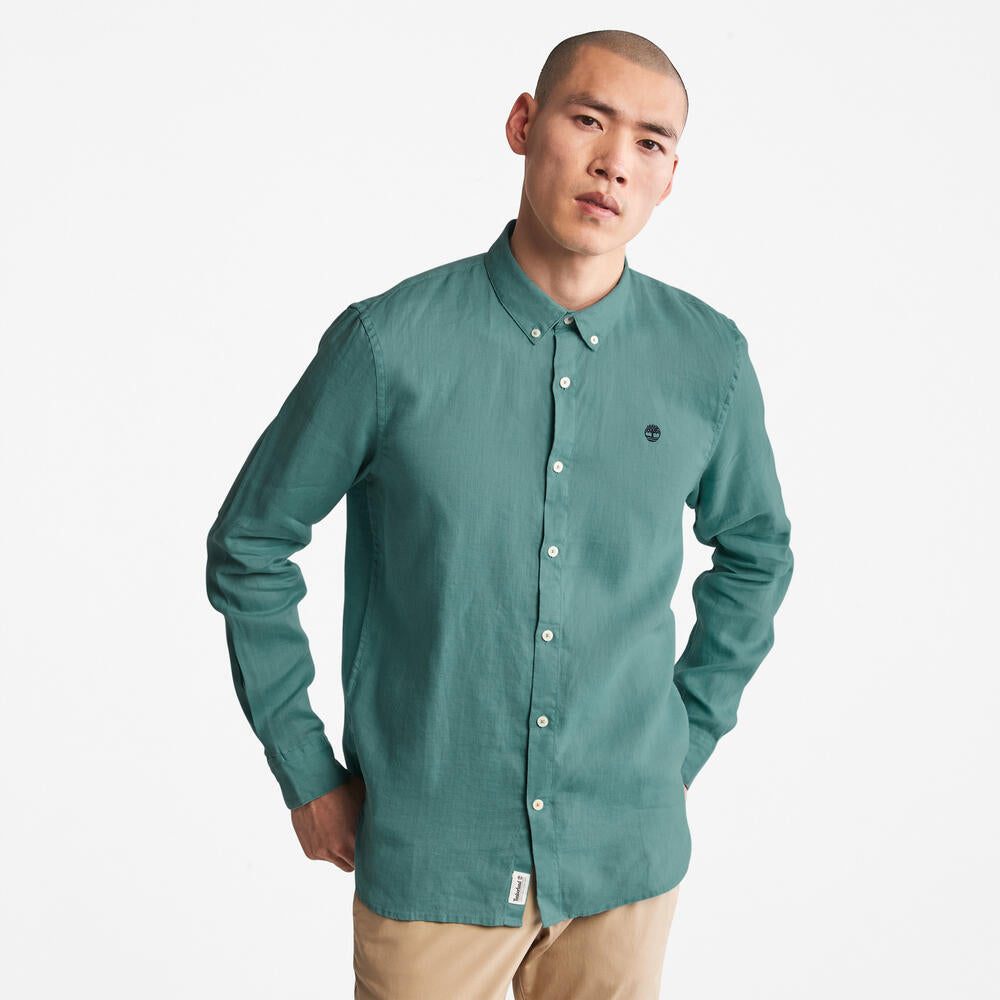Timberland Mill Brook Linen Shirt for Men in Teal. Teal linen shirt for men with a button-down collar and relaxed fit. Perfect for warm weather and casual occasions.