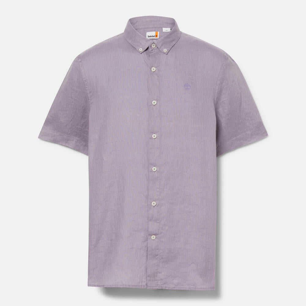 Timberland® Mill Brook Linen Short Sleeve Shirt for Men in Purple. Purple linen shirt with button-down collar and short sleeves. Relaxed fit for a comfortable and stylish look. Perfect for warm weather and casual occasions.