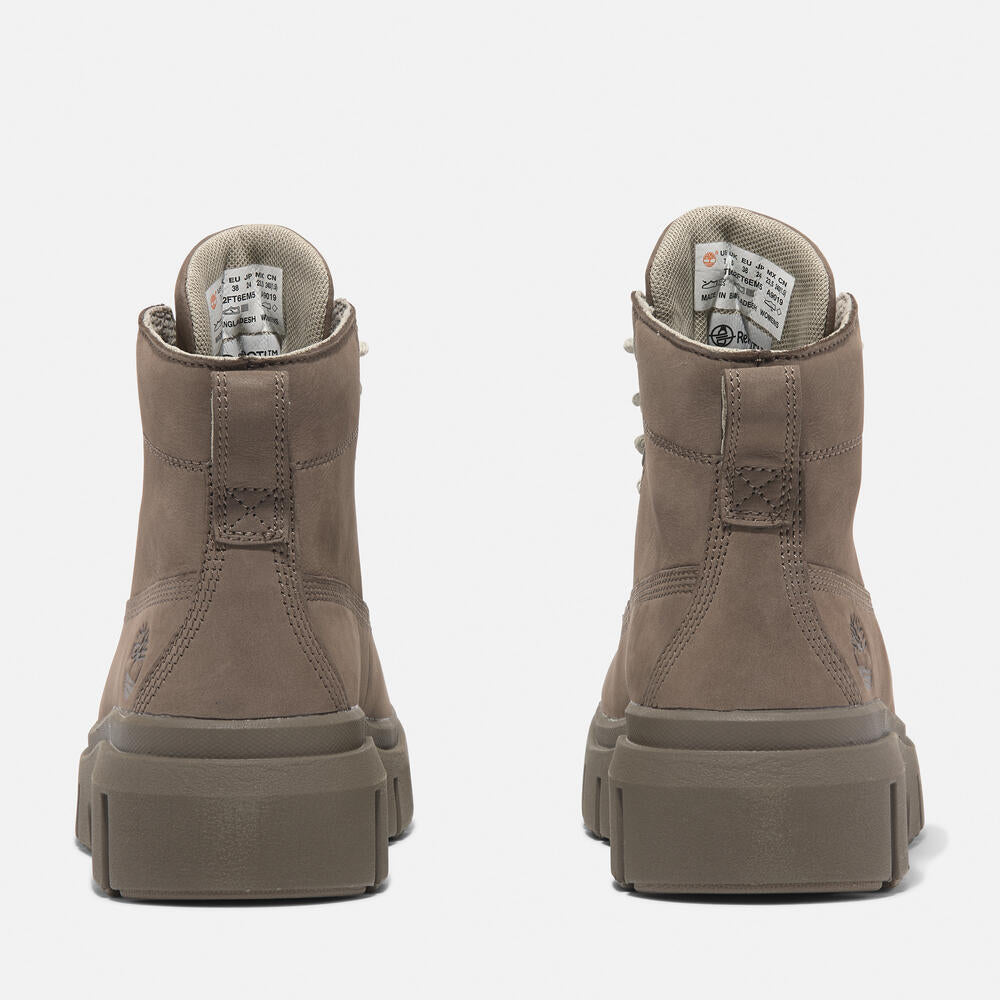 Timberland Greyfield Mid Lace-Up Boot for Women.  Leather boot with lace-up closure, ReBOTL lining, and comfortable cushioning. Versatile for casual wear and urban exploring