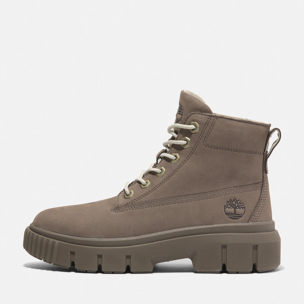 Timberland Greyfield Mid Lace-Up Boot for Women.  Leather boot with lace-up closure, ReBOTL lining, and comfortable cushioning. Versatile for casual wear and urban exploring