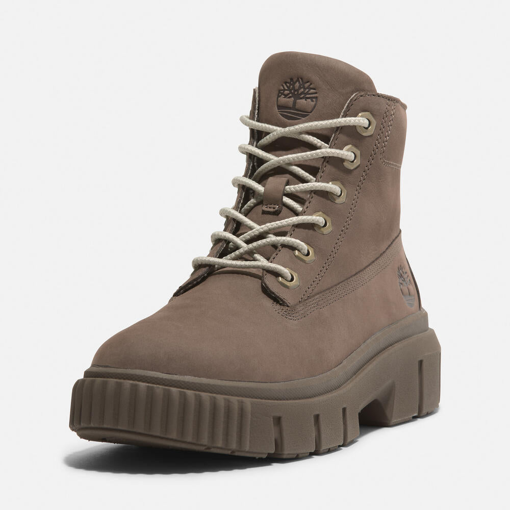 Timberland Greyfield Mid Lace-Up Boot for Women.  Leather boot with lace-up closure, ReBOTL lining, and comfortable cushioning. Versatile for casual wear and urban exploring