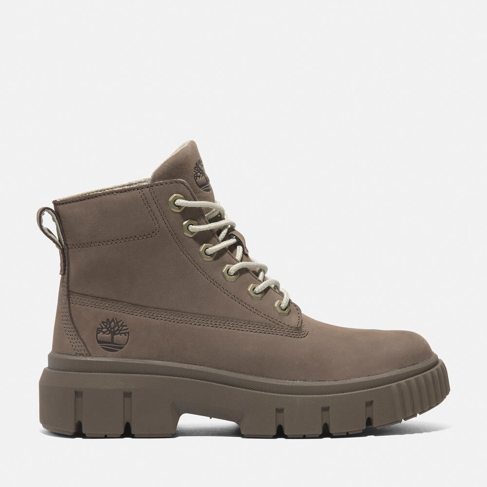 Timberland Greyfield Mid Lace-Up Boot for Women.  Leather boot with lace-up closure, ReBOTL lining, and comfortable cushioning. Versatile for casual wear and urban exploring