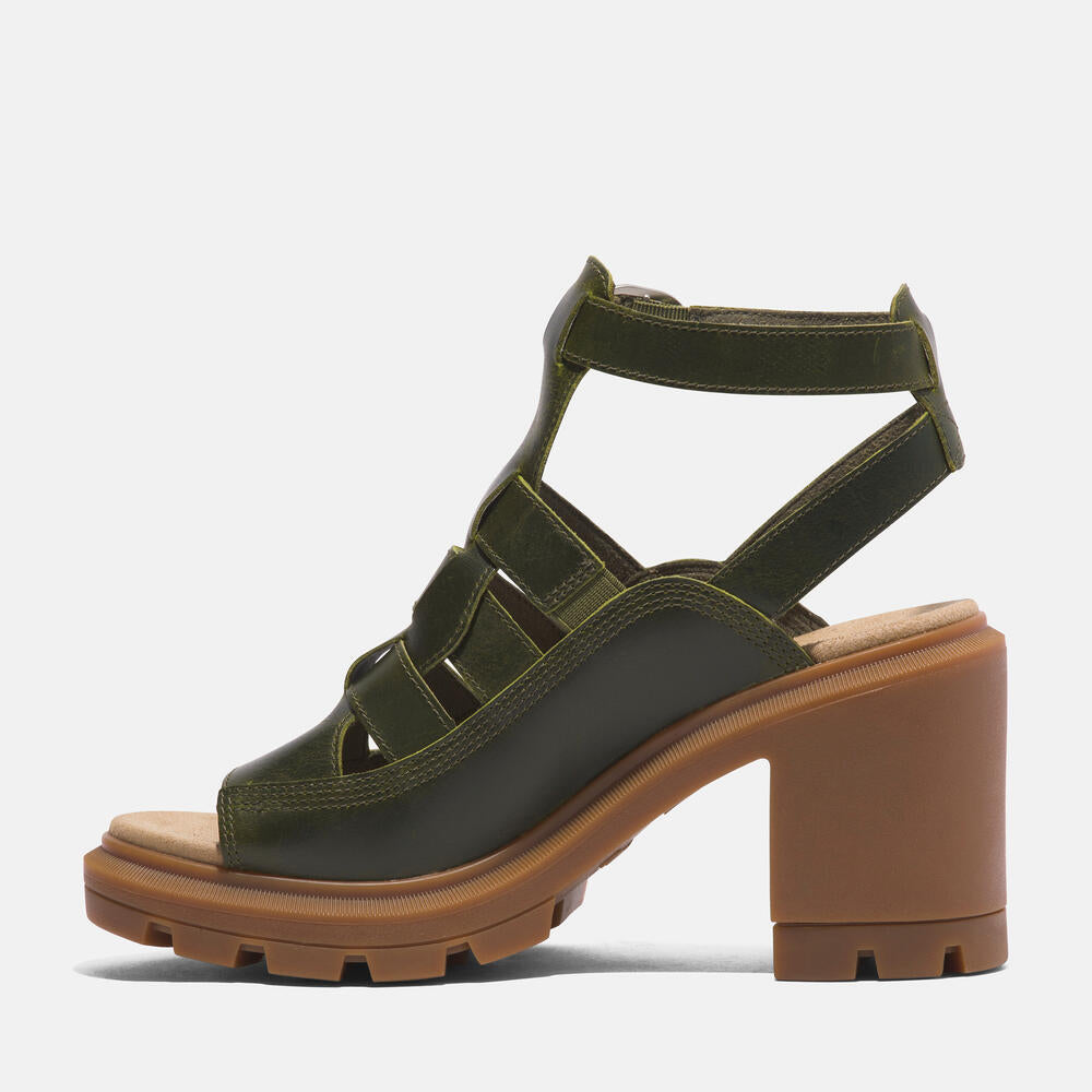 Timberland Allington Heights Fisherman Sandal for Women in Dark Green. Dark green leather sandal with adjustable buckle closure, OrthoLite footbed, and rubber outsole. Stylish and comfortable for various occasions.