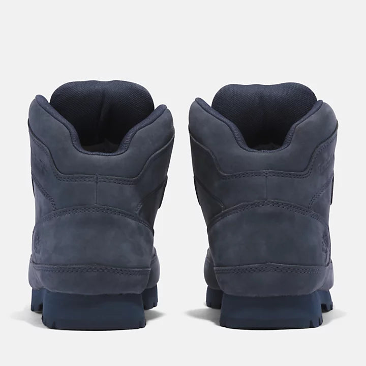 Dark blue nubuck Timberland Euro Hiker Boot for Men. Premium nubuck leather for durability and style. Seam-sealed construction for waterproof protection. Padded collar for comfort, lace-up closure for fit