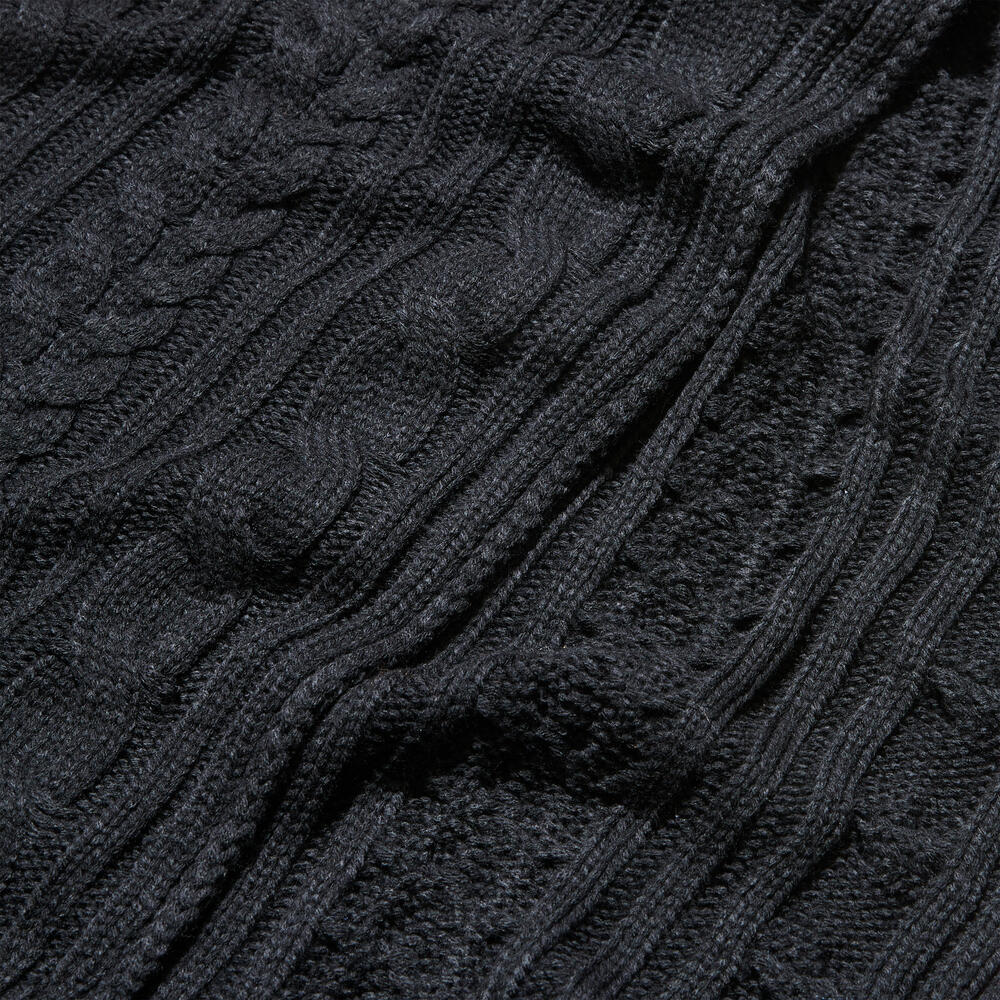 Black Timberland® Cable Knit Scarf for Women. Soft and chunky yarn blend for warmth and comfort. Cable knit design for texture and style. Classic black color for versatility.