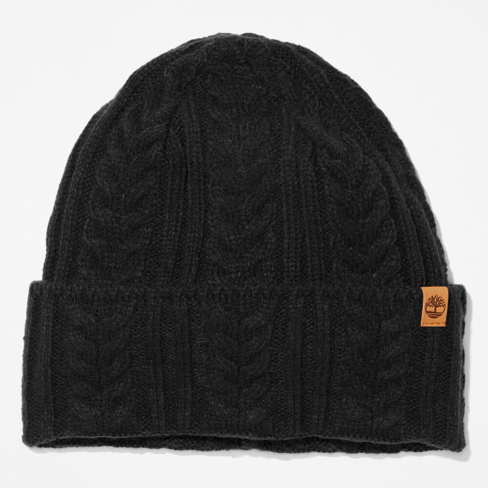 Black Timberland® Cable Knit Beanie for Women. Soft and chunky cable knit for warmth and texture. Fold-over cuff for adjustability. Black colour for versatility.