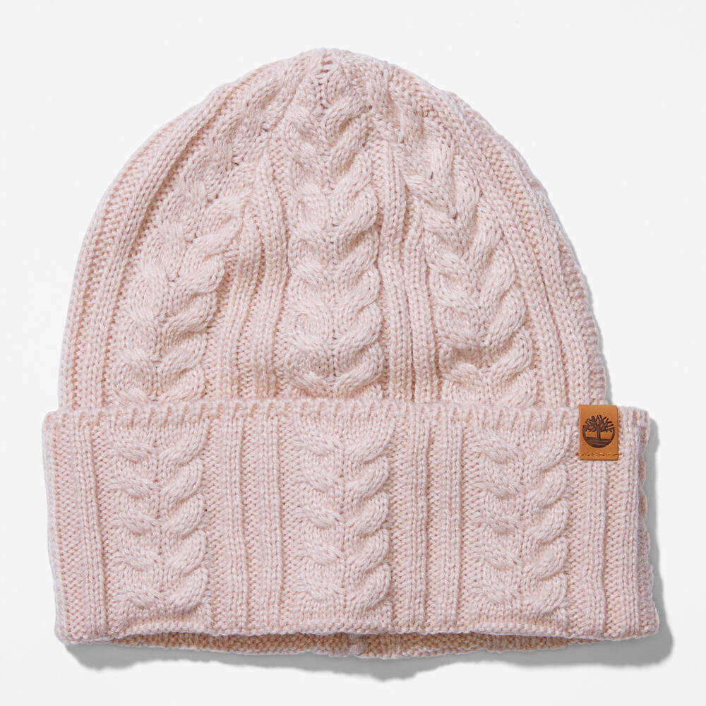 Rose Timberland® Cable Knit Beanie for Women. Soft and chunky cable knit for warmth and texture. Fold-over cuff for adjustability. Rose colour for a feminine touch.