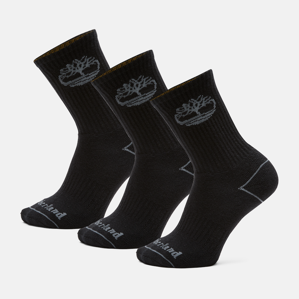 Timberland® Bowden 3-Pack Logo Crew Socks for Men in Black. Three-pack of black crew socks featuring a full cushion construction for comfort, knit-in Timberland® logo across the toe for subtle branding, and a ribbed construction for a stay-up fit. Perfect for everyday wear with boots, sneakers, or casual shoes.