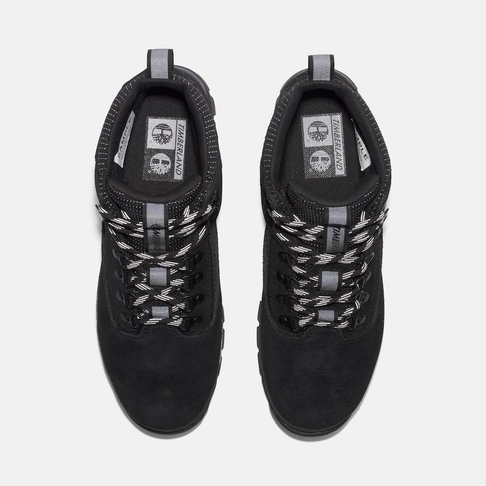 Black Timberland Men's Euro Hiker Mid Lace-Up with Gore-Tex Boot. Black leather and mesh upper for durability and breathability. Gore-Tex bootie for waterproof protection. EVA footbed for cushioning. Protective rubber rand for durability. Durable rubber outsole with lugs for traction.