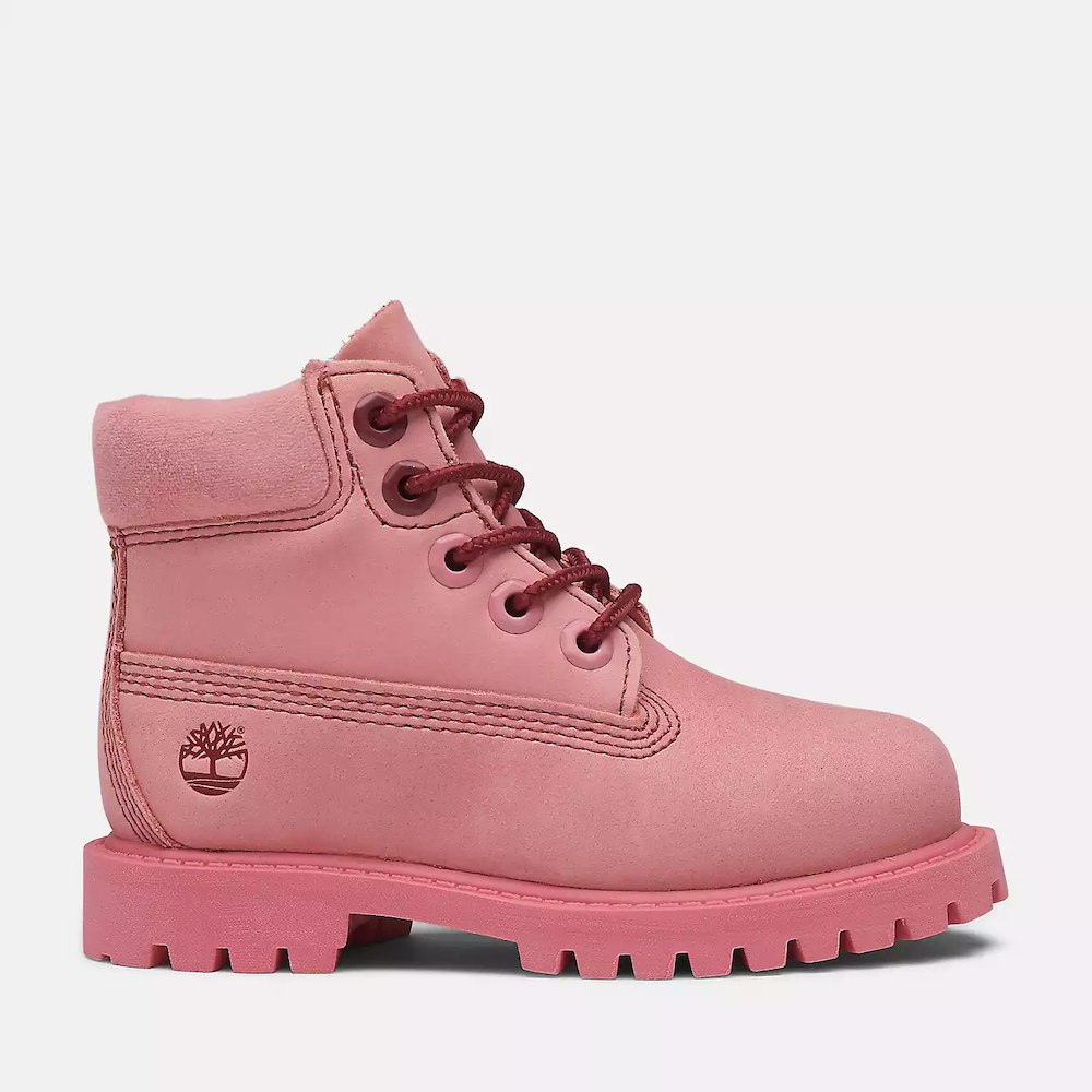 Pink Timberland® Premium 6-Inch Waterproof Boot for Toddler. Leather upper for durability and style. Seam-sealed construction for waterproof protection. Padded collar for comfort. EVA footbed for cushioning. Lace-up closure for fit. PrimaLoft® insulation for warmth. Steel shank for arch support.
