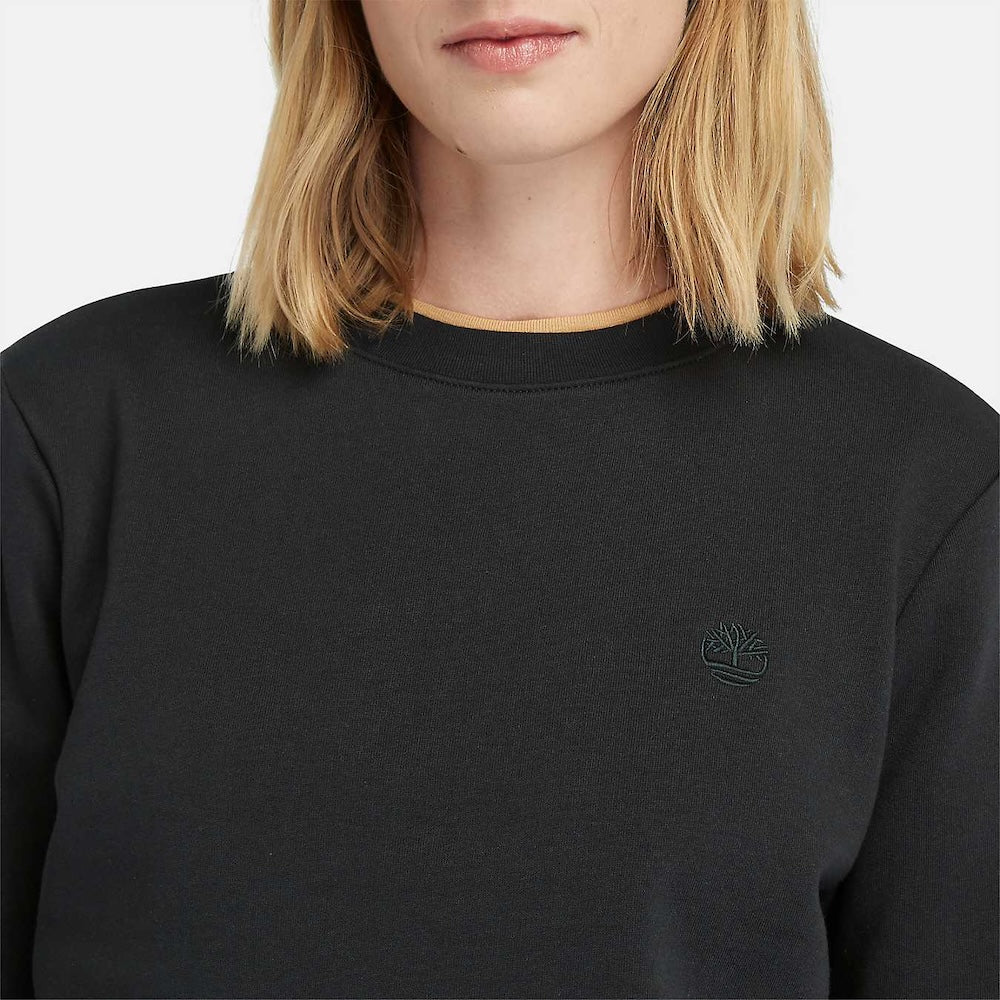 Black Timberland® Brushed Back Crew Neck Sweatshirt for Women. Soft, brushed-back fleece for warmth and comfort. Classic crew neck design for timeless style. Ribbed cuffs and hem for snug fit