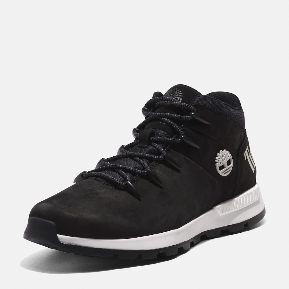 Black Timberland Sprint Trekker Men's Hiker. Mid-height black hiking boot with mixed-media upper for durability and eco-consciousness. Lightweight design for comfort. Cushioned footbed, supportive midsole, lace-up closure for fit. Durable outsole for traction on trails.