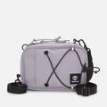 Timberland Outdoor Archive 2.0 Crossbody Bag in Lilac Ash.Ã‚Â Lilac Ash crossbody bag made from 100% recycled polyester.Features a large zipper opening,Ã‚Â front panel slip pocket with bungee system,Ã‚Â adjustable shoulder strap,Ã‚Â and two ways to wear.Ã‚Â Compact size and lightweight design.Ã‚Â Sustainable choice for everyday use.