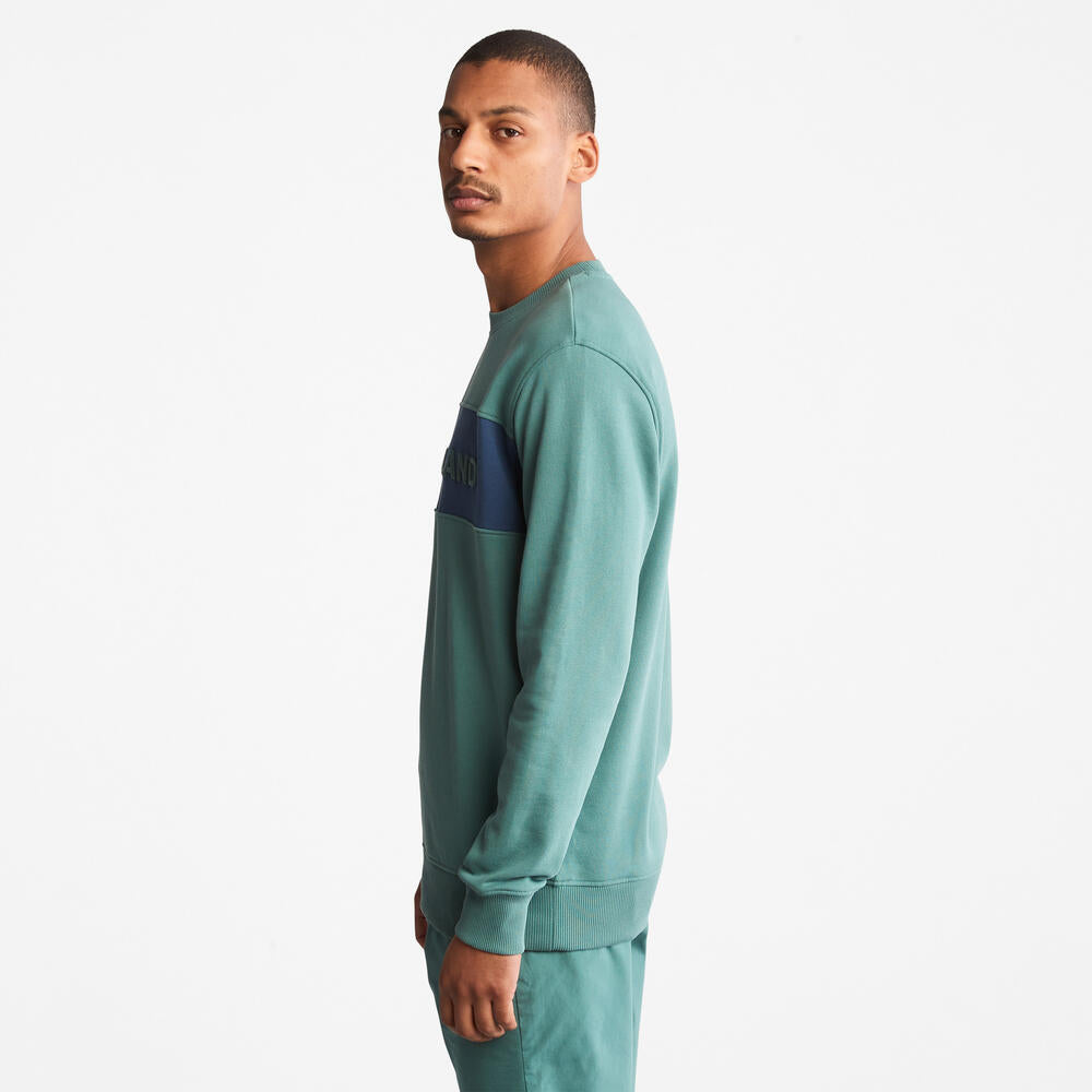 Teal TimberlandÂ® Linear Logo Carrier Crew Neck Sweatshirt for Men. Bold linear TimberlandÂ® logo.Â Ribbed cuffs and hem for a snug fit.Â Crewneck design for versatility.