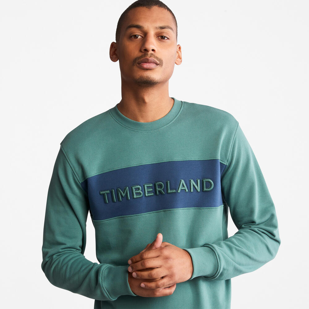 Teal TimberlandÂ® Linear Logo Carrier Crew Neck Sweatshirt for Men. Bold linear TimberlandÂ® logo.Â Ribbed cuffs and hem for a snug fit.Â Crewneck design for versatility.