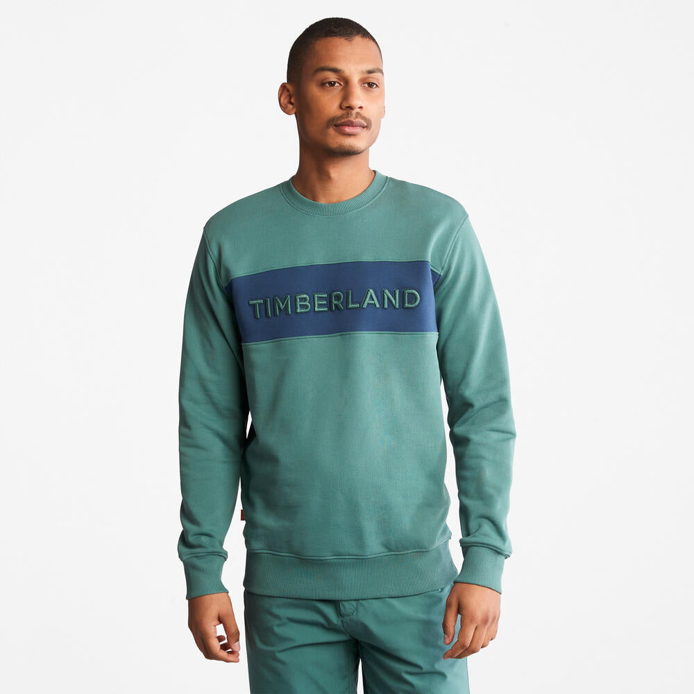 Teal TimberlandÂ® Linear Logo Carrier Crew Neck Sweatshirt for Men. Bold linear TimberlandÂ® logo.Â Ribbed cuffs and hem for a snug fit.Â Crewneck design for versatility.